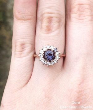 Alexandrite cluster halo engagement ring