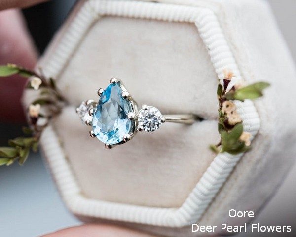 Aquamarine pear moissanite and 14k gold twig engagement ring