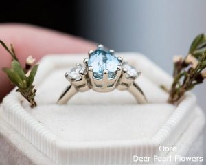 Aquamarine pear moissanite and 14k gold twig engagement ring