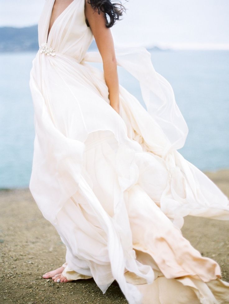 Deep v neck breach flowing beach wedding gown