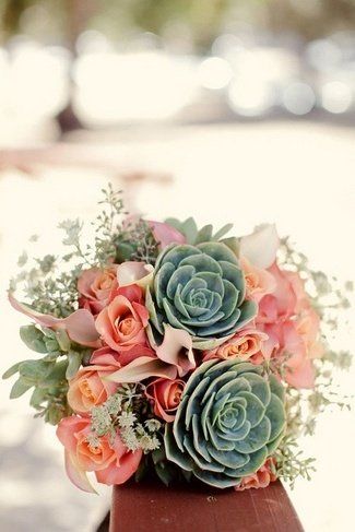 coral pink roses and succlent bridal bouquet