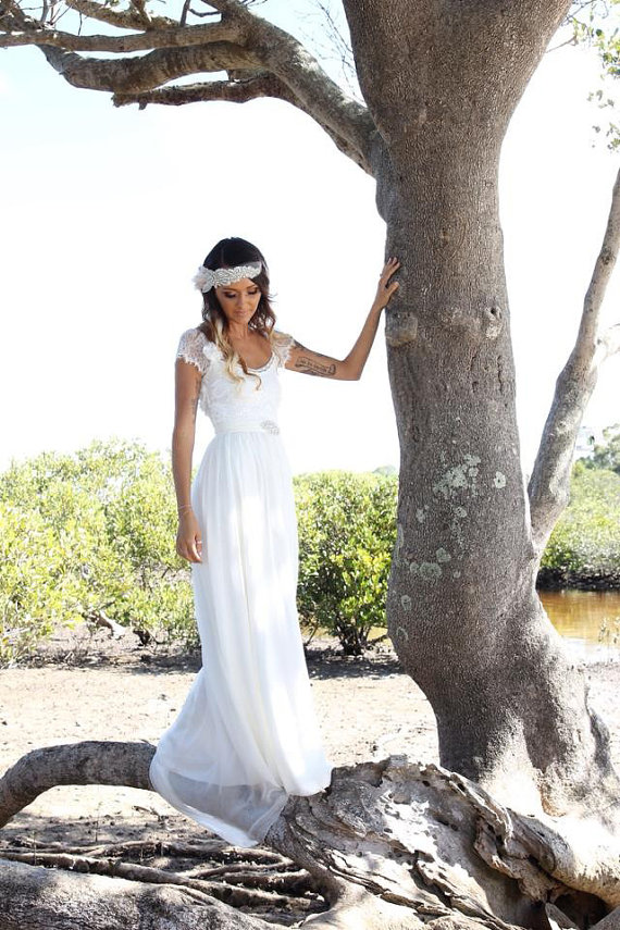 simple beach wedding dress with short sleeves and scooped back