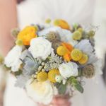 gray succulent yellows billy balls and white roses wedding bouquet