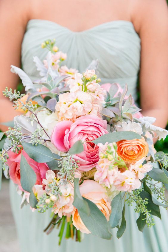 Colorful rose, dusty miller and eucalyptus wedding bouquet