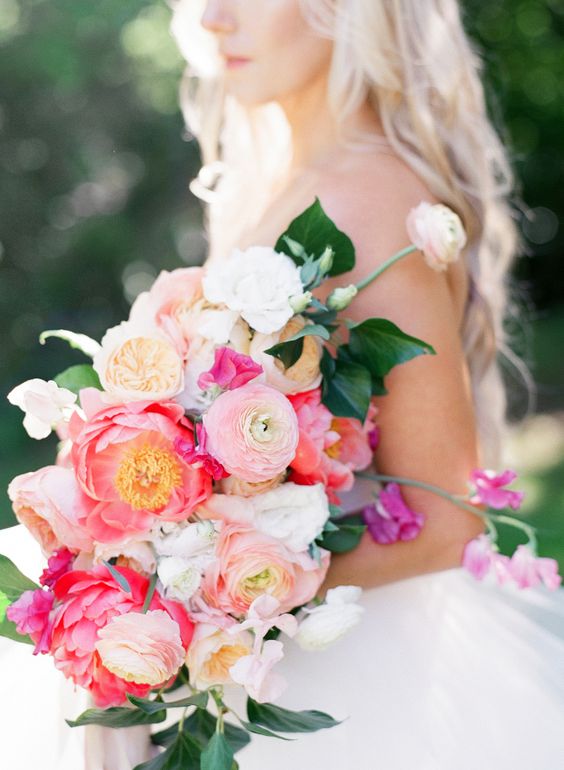 Pink ranunculus, garden rose and coral charm peony bouquet