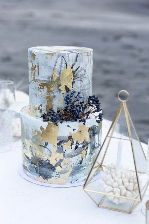 ink and gold leaf wedding cake